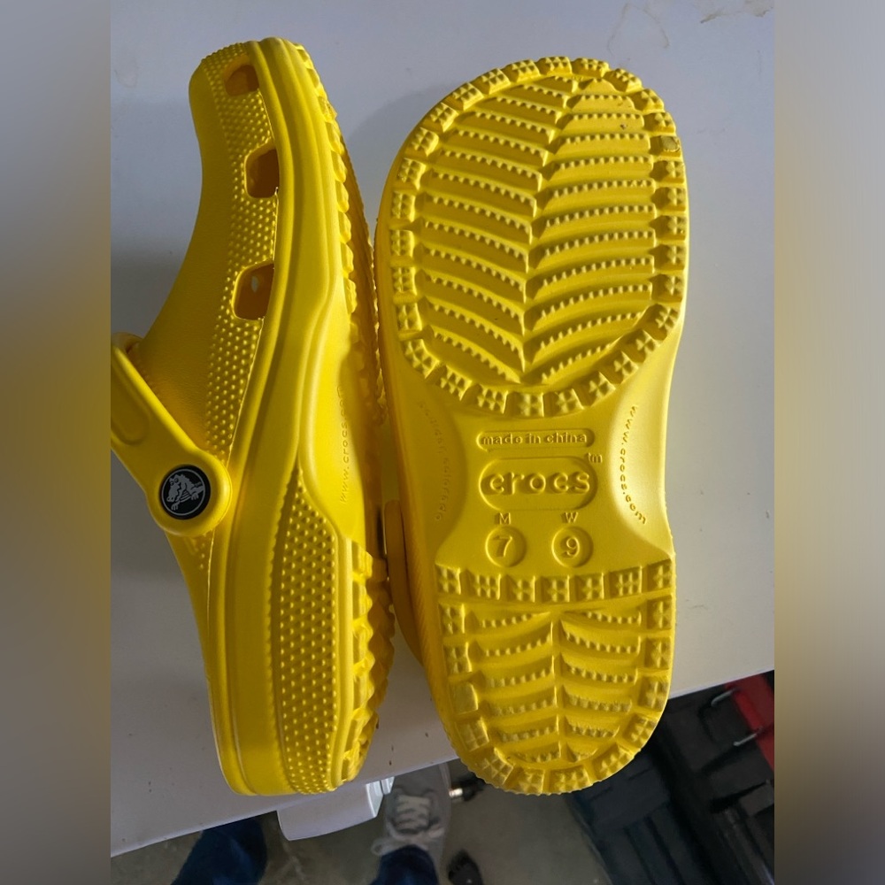 Crocs, new, daughter may have worn once, size 9